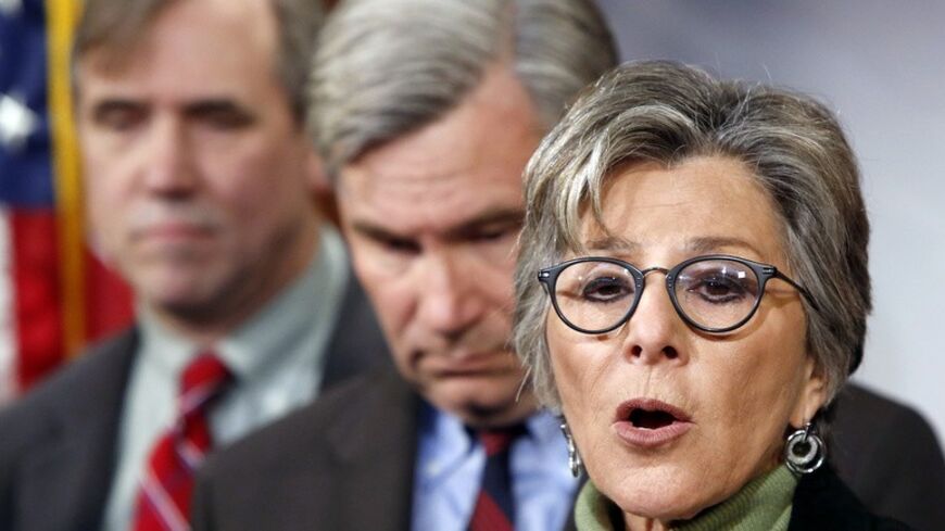 U.S. Senator Barbara Boxer (D-CA) leads a news conference to draw attention to climate change at the U.S. Capitol in Washington, January 14, 2014. Also pictured are U.S. Senator Jeff Merkley (D-OR) (L) and Senator Sheldon Whitehouse (D-RI) (2nd L). REUTERS/Jonathan Ernst  (UNITED STATES - Tags: POLITICS ENVIRONMENT) - RTX17E1Y
