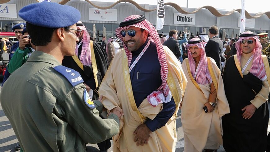 Saudi Arabia's Prince Turki bin Abdullah al Saud, deputy governor of the Riyadh, meets Saudi Royal Force pilots during the inauguration of the Bahrain International Airshow held at the Sakhir Air Base,  south of Manama, January 16, 2014. REUTERS/Hamad I Mohammed (BAHRAIN - Tags: ROYALS POLITICS TRANSPORT MILITARY) - RTX17GM3