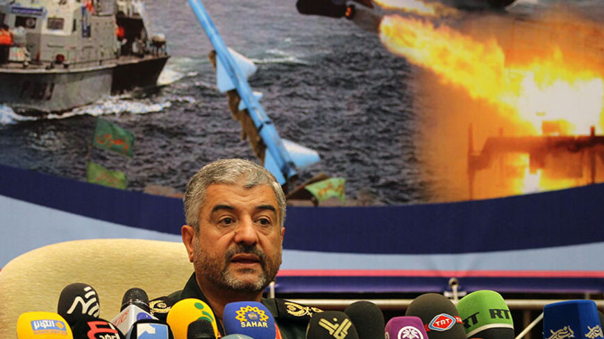 Iranian Revolutionary Guards commander Brigadier General Mohammad Ali Jafari holds a press conference in Tehran on September 16, 2012. Jafari said members of his elite special operations unit, the Quds Force, are present in Syria and Lebanon but only to provide "counsel." AFP PHOTO/ATTA KENARE        (Photo credit should read ATTA KENARE/AFP/GettyImages)
