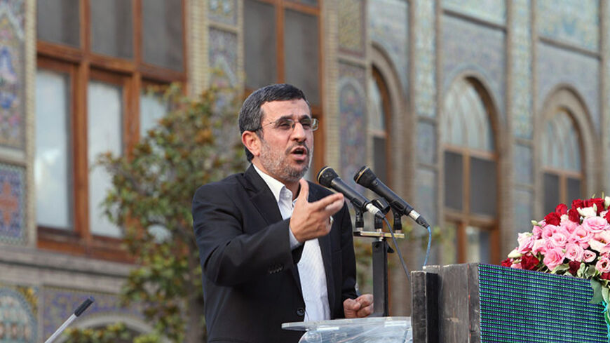 Iranian outgoing President Mahmoud Ahmadinejad in mid-June gives a speech during a ceremony at Tehran's Golestan Palace celebrating its inscription on the UNESCO World Heritage List on July 7, 2013. The palace,  built in the 16th century, is a masterpiece of the art of the Qajar period.   AFP PHOTO/ATTA KENARE