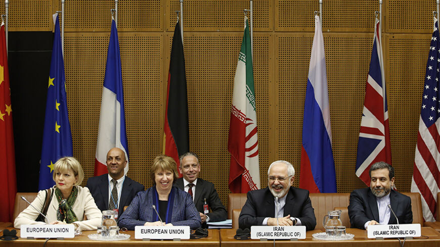 (L to R)  EU Deputy Secretary General Helga Schmid, Vice President of the European Commission Catherine Margaret Ashton, Iranian Foreign Minister Mohammad Javad Zarif and Iranian ambassador to Austria Hassan Tajik attend the so called EU 5+1 Talks with Iran at the UN headquarters in Vienna, on June 17, 2014. The United States and Iran briefly discussed the crisis in Iraq on the sidelines of a critical fifth round of nuclear talks in Vienna, US officials said on June 16, 2014. AFP PHOTO / DIETER NAGL