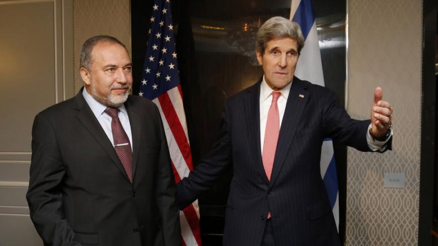 U.S. Secretary of State John Kerry (R) meets Israeli Foreign Minister Avigdor Lieberman in Rome, March 6, 2014. REUTERS/Kevin Lamarque (ITALY - Tags: POLITICS) - RTR3G4K4