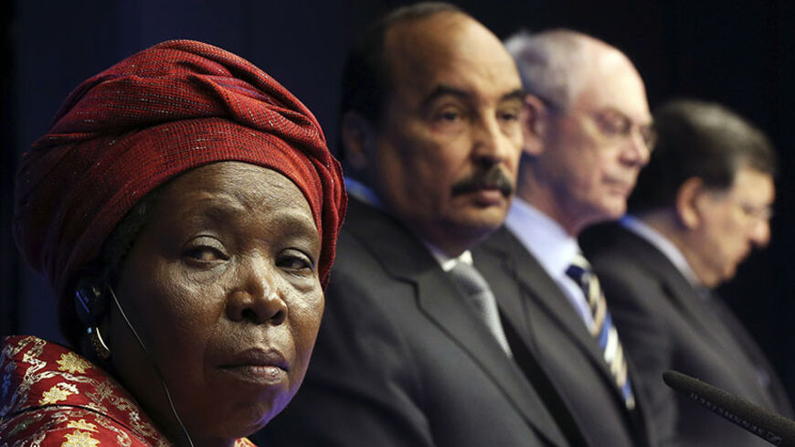 Chairperson of the African Union Commission Nkosazana Dlamini-Zuma, Mauritania's President and African Union's Chairperson Mohamed Ould Abdel Aziz, European Council's President Herman Van Rompuy and European Commission's President Jose Manuel Barroso (L-R) hold a joint news conference during an European Union (EU)-Africa summit in Brussels April 3, 2014.   REUTERS/Francois Lenoir (BELGIUM - Tags: POLITICS) - RTR3JSD6