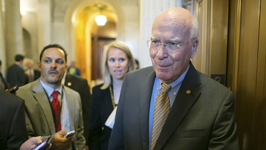 U.S. Senator Pat Leahy (D-VT) talks to reporters after the weekly Democratic caucus luncheon at the U.S. Capitol in Washington April 29, 2014.  REUTERS/Jonathan Ernst    (UNITED STATES - Tags: POLITICS) - RTR3N4Z3