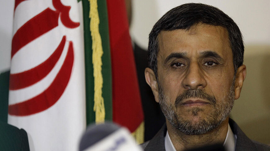 Iran's President Mahmoud Ahmadinejad visits Imam Ali shrine in Najaf, Iraq, July 19, 2013. REUTERS/Karim Kadim/Pool (IRAQ - Tags: POLITICS) - RTX11RSP