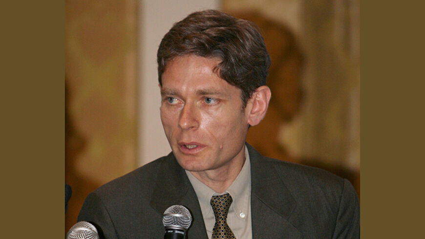 Tom Malinowski, the Washington advocacy director of Human Rights Watch (HRW), addresses a conference in Tripoli on December 12, 2009, attended by journalists, Western diplomats and families of the victims of a 1996 massacre by Libyan security forces of at least 1,200 prisoners. The New York-based HRW presented its report on Libya for the first time in the capital Tripoli, saying the north African country is making some progress on freedom of speech, eventhough a climate of repression remains. The report cam