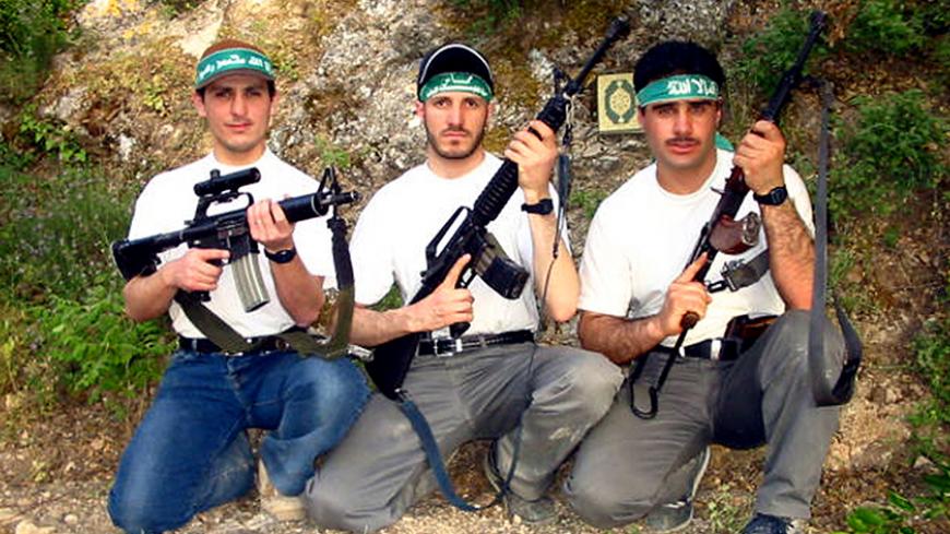 Undated file picture of three Hamas militants Ahmad Bader (L) Basel
Qawasmeh (C) and I'zzedin Misk (R). Basel Qawasmeh was killed September
22, 2003, during an Israeli military operation in the West Bank city
Hebron while Ahmed Bader and I'zzedin Misk were killed on September 9,
2003. REUTERS/Nayef Hashlamoun REUTERS

EG/NH - RTR3CT5