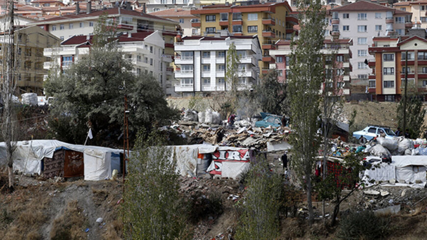 Makeshift tents of Syrian refugees are seen in a wooded area in central Ankara October 5, 2013. Some 150 Syrians, mostly from villages near Syria's Aleppo, prefer to settle in the central Turkish capital instead of refugee camps run by the Turkish government. According to the families, this allows them to work as daily workers. Most of them collect plastic and paper garbage from the trash cans of buildings for recycling and sell it to make money. REUTERS/Umit Bektas (TURKEY - Tags: SOCIETY IMMIGRATION POLIT