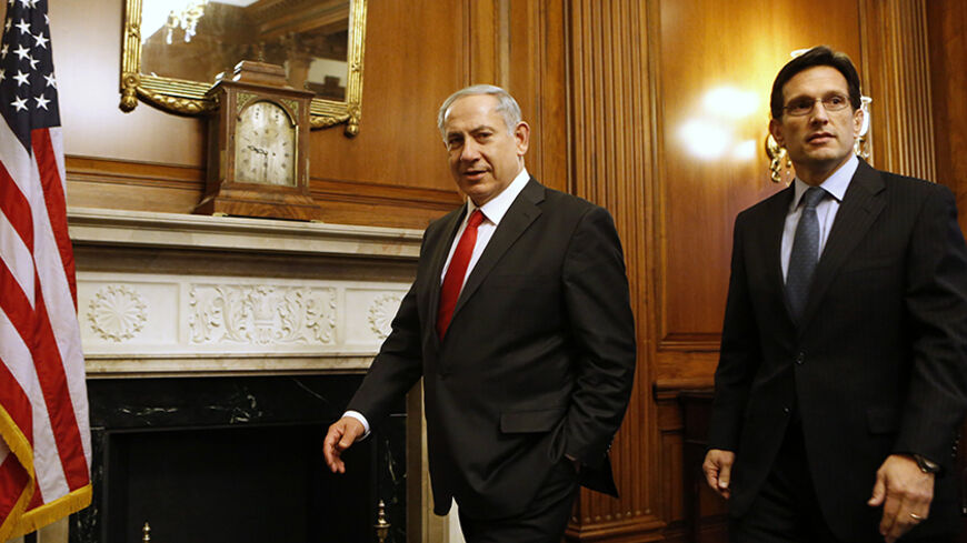Israel's Prime Minister Benjamin Netanyahu (L) walks next to House Majority Leader Eric Cantor (R-VA) before pre-bipartisan meeting on Capitol Hill in Washington March 3, 2014. Netanyahu bluntly told Barack Obama on Monday that Israelis expected their leader not to compromise on their security even as the U.S. president sought to reassure him on Iran diplomacy and pressure him on Middle East peace talks. In White House talks overshadowed by the Ukraine crisis, the two leaders tried to avoid any direct clash