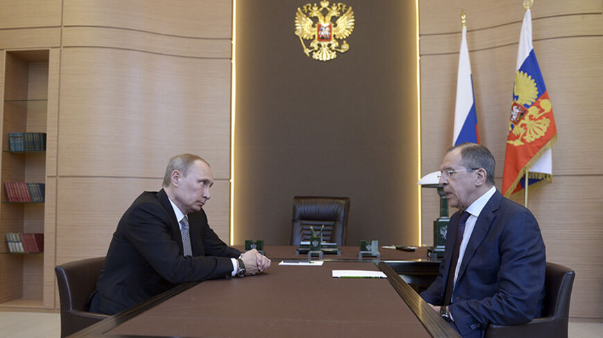 Russia's President Vladimir Putin (L) meets with Foreign Minister Sergei Lavrov at the Bocharov Ruchei state residence in Sochi, March 10, 2014. Lavrov told Putin on Monday that Russia's position on Ukraine was at odds with the West, and that U.S. Secretary of State John Kerry had declined an invitation to visit Russia for further talks. At a meeting with Putin in the Black Sea resort of Sochi, Lavrov described being handed proposals by U.S. Secretary of State John Kerry which "did not completely satisfy us