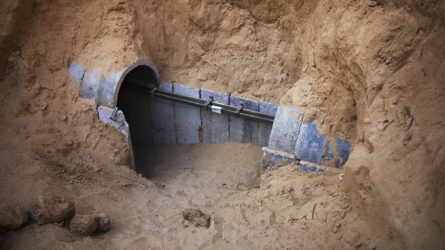 The entrance to a tunnel exposed by the Israeli military is seen on the Israeli side of the Israel-Gaza border March 27, 2014. The Israeli Defence Forces (IDF) announced that they exposed the tunnel on March 21, 2014. REUTERS/Amir Cohen (ISRAEL - Tags: POLITICS) - RTR3IVTV
