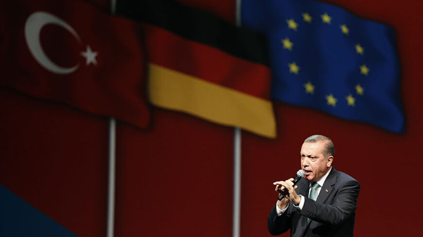 Turkish Prime Minister Tayyip Erdogan speaks to supporters during his visit in Cologne May 24, 2014.            REUTERS/Wolfgang Rattay (GERMANY  - Tags: POLITICS)   - RTR3QO46