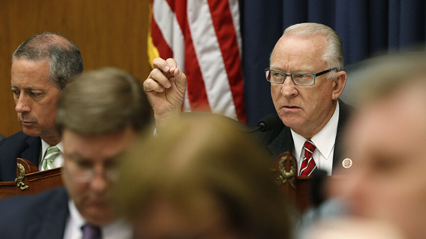 Committee Chairman Representative Buck McKeon (R-CA) (R) questions U.S. Defense Secretary Chuck Hagel and Defense Department General Counsel Stephen Preston about the Bergdahl prisoner exchange at a House Armed Services Committee hearing on Capitol Hill in Washington June 11, 2014. Hagel on Wednesday defended the U.S. decision to trade five Taliban leaders at Guantanamo for war prisoner Bowe Bergdahl, insisting it was the right move but admitting failure to tell lawmakers hurt trust with Congress. Also pict