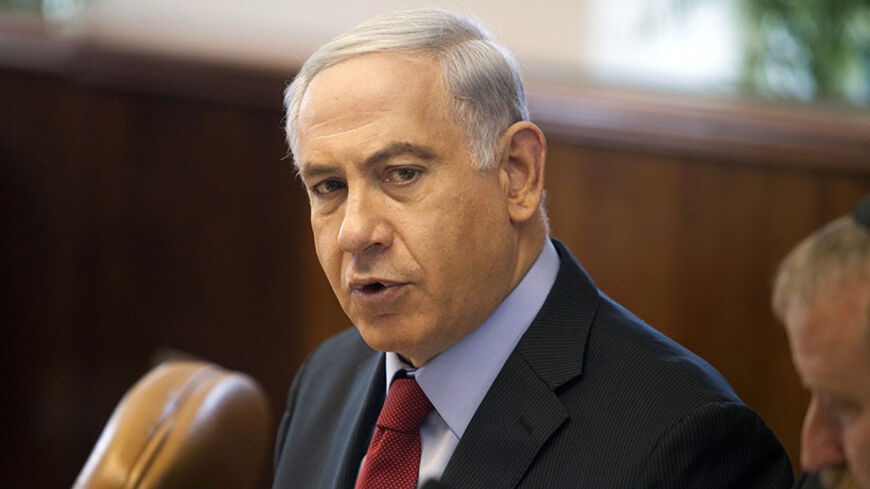 Israel's Prime Minister Benjamin Netanyahu attends a cabinet meeting at his office in Jerusalem June 29, 2014. REUTERS/Dan Balilty/Pool (JERUSALEM - Tags: POLITICS) - RTR3W9I3