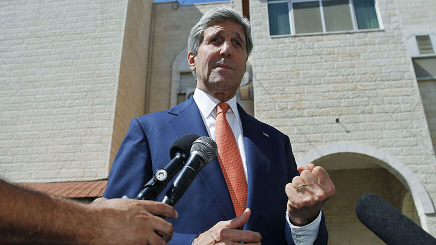 U.S. Secretary of State John Kerry speaks to reporters after meeting Palestinian President Mahmoud Abbas in the West Bank city of Ramallah July 23, 2014. Israeli forces pounded Gaza on Wednesday, meeting stiff resistance from Hamas Islamists and sending thousands of residents fleeing, as Kerry said on his visit to Israel ceasefire talks had made some progress. Israel launched its offensive on July 8 to halt missile salvoes by Hamas and its allies, struggling under the weight of an Israeli-Egyptian economic 