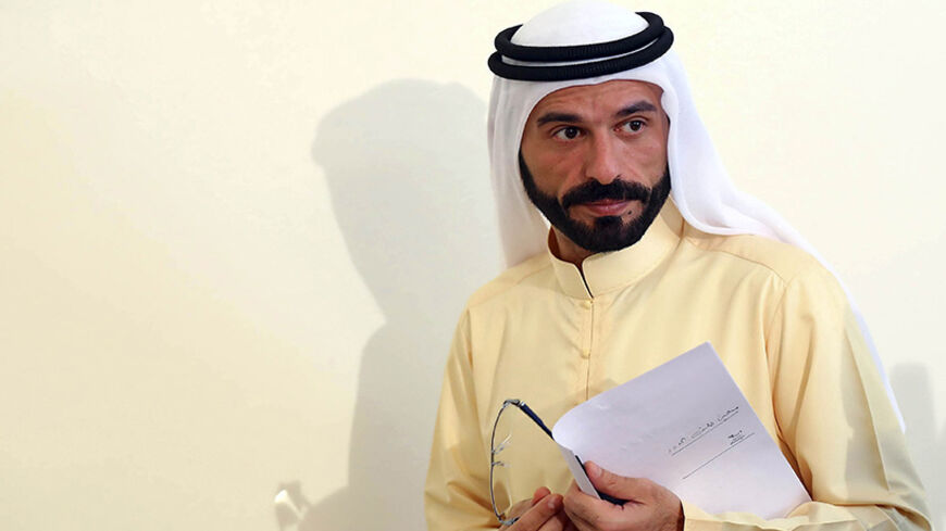 Sheikh Ali Hatem Sulaiman, head of the Dulaimi tribe, which dominates Ramadi and the sprawling desert province of Anbar, walks after the end of the a news conference in Arbil, the capital of the autonomous Kurdish region of northern Iraq, May 13, 2014.     REUTERS/Stringer (IRAQ  - Tags: CIVIL UNREST POLITICS) - RTR3ZVR3