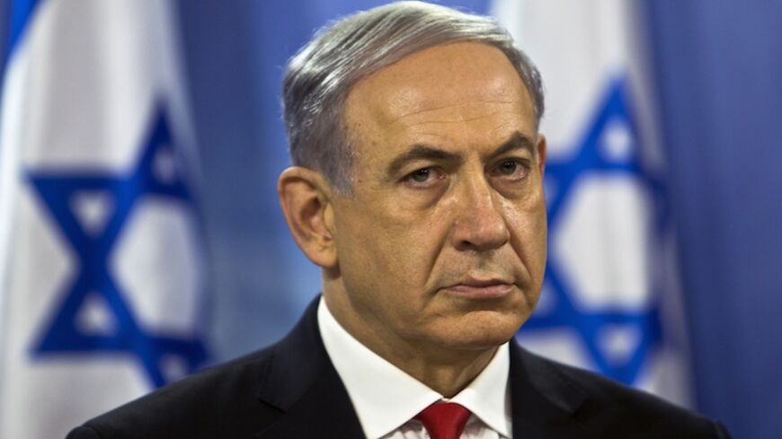 Israel's Prime Minister Benjamin Netanyahu attends a news conference in Tel Aviv July 28, 2014. Palestinian fighters slipped into an Israeli village from the Gaza Strip and fought a gun battle with troops on Monday as an unofficial truce called for the Muslim Eid al-Fitr festival disintegrated. The incident was not the only breach of the fragile truce. Eight children and two adults were killed by a blast at a park in northern Gaza and four Israelis were reported to have been killed by cross-border Palestini