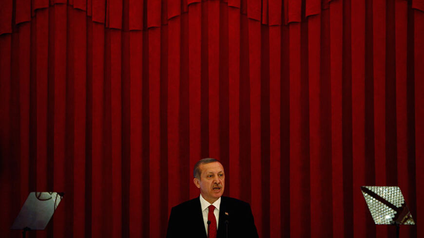Turkey Prime Minister Tayyip Erdogan speaks during a conference in Ankara, June 18, 2013. REUTERS/Dado Ruvic (TURKEY - Tags: POLITICS CIVIL UNREST) - RTX10S1B