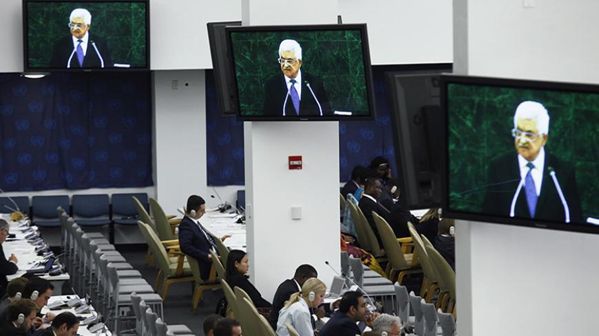 Members of delegations listen to Palestinian President Mahmoud Abbas address the 68th United Nations General Assembly at U.N. headquarters in New York, September 26, 2013. REUTERS/Eduardo Munoz (UNITED STATES - Tags: POLITICS) - RTX140XW