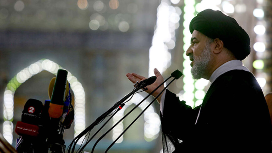 Shiite Muslim Ahmad Safi, the representative of Iraq's Shiite spiritual leader Grand Ayatollah Ali Sistani, gives a sermon at the Imam Hussein mosque during the Friday prayer on June 20, 2014 in the Shrine city of Karbala in central Iraq. Iraq's top Shiite cleric, Grand Ayatollah Ali al-Sistani called for the country's next government to be "effective" and avoid past mistakes, in an implicit criticism of the embattled incumbent premier.     AFP PHOTO/MOHAMMED SAWAF        (Photo credit should read MOHAMMED 