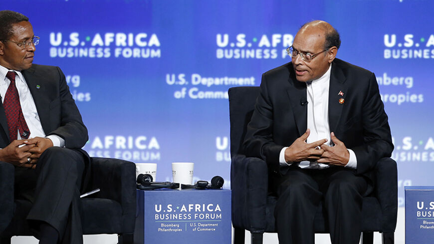 Tanzania's President Jakaya Mrisho Kikwete (L-R) and Tunisia's President Mohamed Moncef Marzouki participate in a panel discussion on the future of Africa during the U.S.-Africa Business Forum in Washington August 5, 2014. The forum is part of the U.S.-Africa Leaders Summit bringing nearly fifty African heads of state together for three days of meetings and events.  REUTERS/Jonathan Ernst    (UNITED STATES - Tags: POLITICS BUSINESS) - RTR41CYD