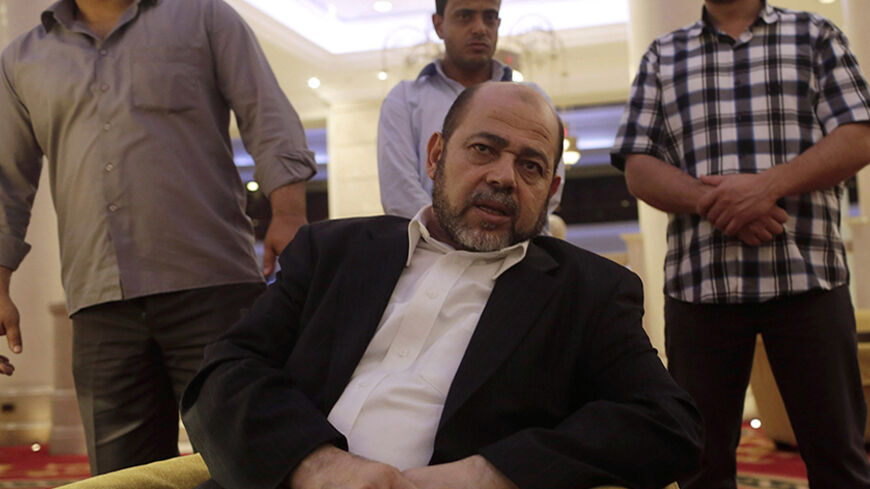 Deputy chairman of Hamas' political bureau Moussa Abu Marzouk talks during an interview with Reuters in Cairo, August 9, 2014. Palestinian negotiators will leave Cairo on Sunday unless Israel agrees to return to Egyptian-mediated negotiations to end the war in Gaza, senior delegation member Marzouk said.         REUTERS/Asmaa Waguih (EGYPT - Tags: POLITICS CONFLICT) - RTR41TT5