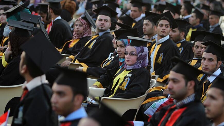 Iraqi students attend their graduation ceremony at Technical University of Baghdad on June 30, 2012 to celebrate receiving their degrees for the first time since the US-led war on Iraq in 2003. The ceremonies were officially stopped by authorities due to the security issues after several attacks and explosions took place at the university since the ousting of former president, Saddam Hussein in 2003. AFP PHOTO/AHMAD AL-RUBAYE        (Photo credit should read AHMAD AL-RUBAYE/AFP/GettyImages)
