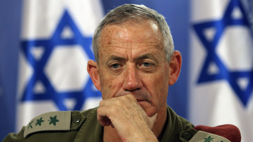 Israeli army Chief of Staff Benny Gantz gestures during a press conference at the Defence Ministry in Tel Aviv on July 28, 2014. Prime Minister Benjamin Netanyahu said Israelis must be ready for a long military campaign in Gaza, after mortar fire from the enclave killed four people in the Jewish state. AFP PHOTO/GIL COHEN-MAGEN        (Photo credit should read GIL COHEN MAGEN/AFP/Getty Images)