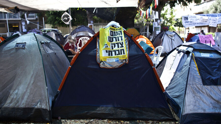 THIS PICTURE IS ONE OF 30 TO ACCOMPANY PICTURE PACKAGE: THE PROTESTERS OF TEL AVIV'S TENT CITY. SEARCH IN YOUR PICTURE SYSTEM FOR KEYWORD "PROTEST" TO SEE ALL IMAGES (PXP01 - 30)

The tent belonging to Eyal Hukayma, a 29-year-old handyman, is pictured at a tent camp on Rothschild Boulevard in south Tel Aviv, part of an ongoing protest against the high cost of living in Israel August 11, 2011. When interviewed by Reuters, Hukayma said, "I set up my tent in Rothschild Boulevard on the first day of the protest