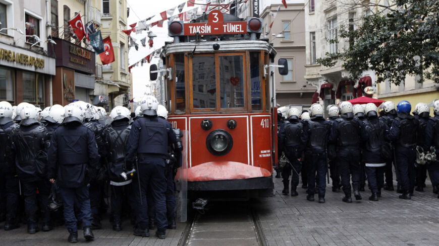 Riot police block the main Istiklal street to prevent pro-Kurdish demonstrators from marching, in central Istanbul February 15, 2012. Supporters of the pro-Kurdish Peace and Democracy Party (BDP) held a protest to mark the 13th anniversary of the capture of Kurdistan Workers' Party (PKK) leader Abdullah Ocalan. REUTERS/Murad Sezer (TURKEY - Tags: POLITICS CIVIL UNREST) - RTR2XWA8