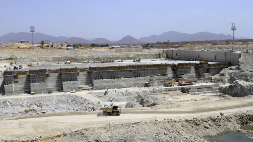 A general view shows construction activity on the Grand Renaissance dam in Guba Woreda, Benishangul Gumuz region March 16, 2014. Egypt fears the $4.7 billion dam, that the Horn of Africa nation is building on the Nile, will reduce a water supply vital for its 84 million people, who mostly live in the Nile valley and delta. Picture taken March 16, 2014. REUTERS/Tiksa Negeri (ETHIOPIA - Tags: ENERGY ENVIRONMENT POLITICS BUSINESS CONSTRUCTION) - RTR3HFQT