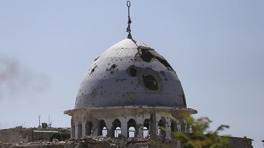 A view of a damaged mosque in Jobar, a suburb of Damascus July 18, 2014. 
REUTERS/Bassam Khabieh (SYRIA - Tags: POLITICS CIVIL UNREST CONFLICT RELIGION) - RTR3Z8JI