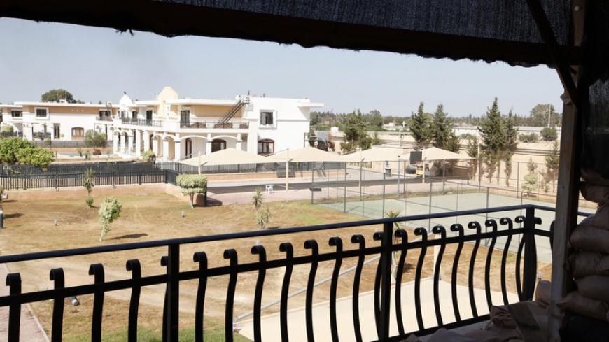 A view of an annex of the U.S. embassy in Tripoli during a media tour organised by Operation Dawn, a group of Islamist-leaning forces mainly from Misrata, August 31, 2014, after the group took over the annex. Members of the group have taken over the annex but have not broken into the main compound where the United States evacuated all of its staff last month, U.S. officials said on Sunday. A YouTube video showed the breach of the vacated diplomatic facility by the group, with dozens of fighters seen crowdin