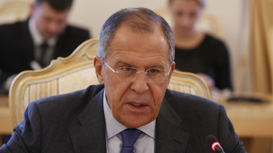 Russia's Foreign Minister Sergei Lavrov addresses his Tunisian counterpart Mongi Hamdi (not pictured) during their meeting in Moscow, September 2, 2014.  REUTERS/Sergei Karpukhin (RUSSIA - Tags: POLITICS) - RTR44LTJ