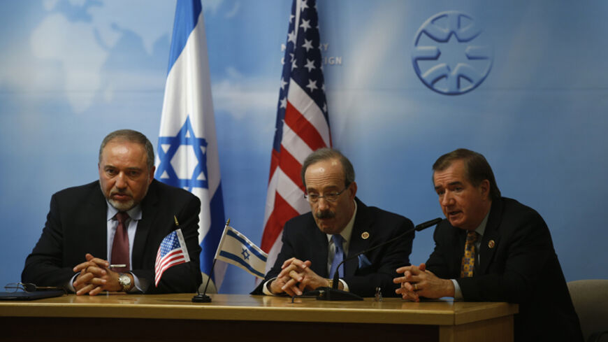 Israel's Foreign Minister Avigdor Lieberman (L) sits with U.S. Representative Eliot Engel (D-NY) (C) and House Foreign Affairs Chairman Ed Royce (R-CA)  during their joint news conference in Jerusalem September 2, 2014. REUTERS/Ronen Zvulun (JERUSALEM - Tags: POLITICS) - RTR44N5C
