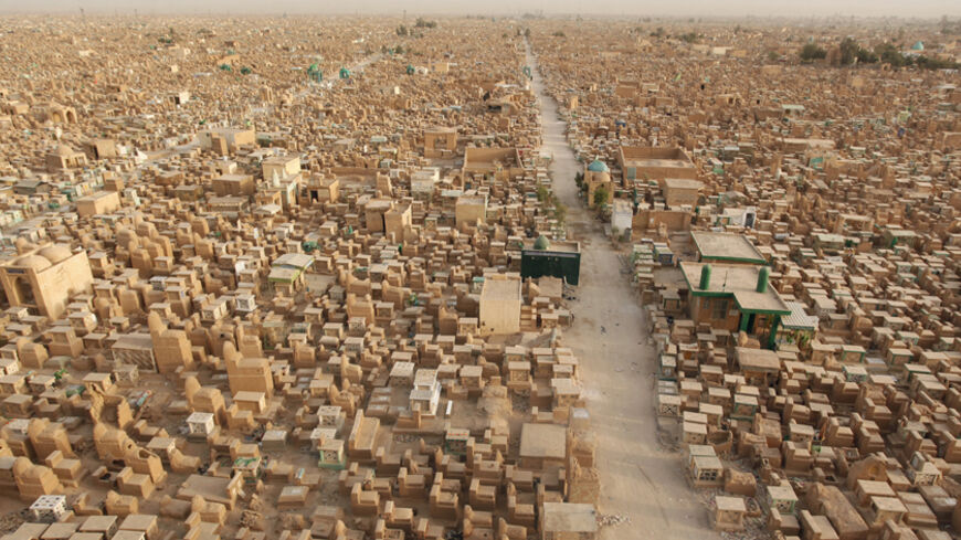The "Valley of Peace" cemetery in Najaf, 160 km (100 miles) south of Baghdad, is seen in this general view taken April 1, 2013.  REUTERS/Haider Ala (IRAQ - Tags: SOCIETY) FOR BEST QUALITY IMAGE ALSO SEE: GM1E94617CL01 - RTXY4JC