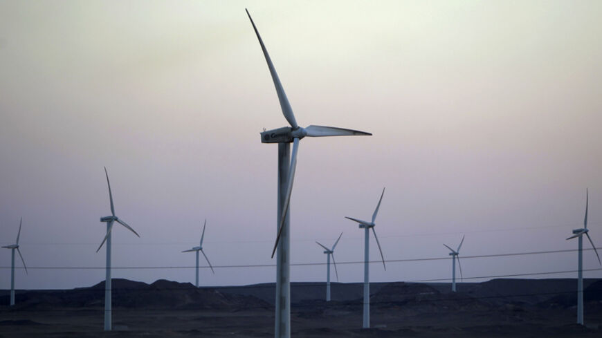 Wind turbines, which generate renewable energy, are seen on the Zafarana Wind Farm, near El Ain El Sokhna port in Suez, 140 km (87 miles) east of Cairo July 6, 2012. Picture taken July 6, 2012. REUTERS/Amr Abdallah Dalsh  (EGYPT - Tags: ENERGY BUSINESS) - RTR34OHM