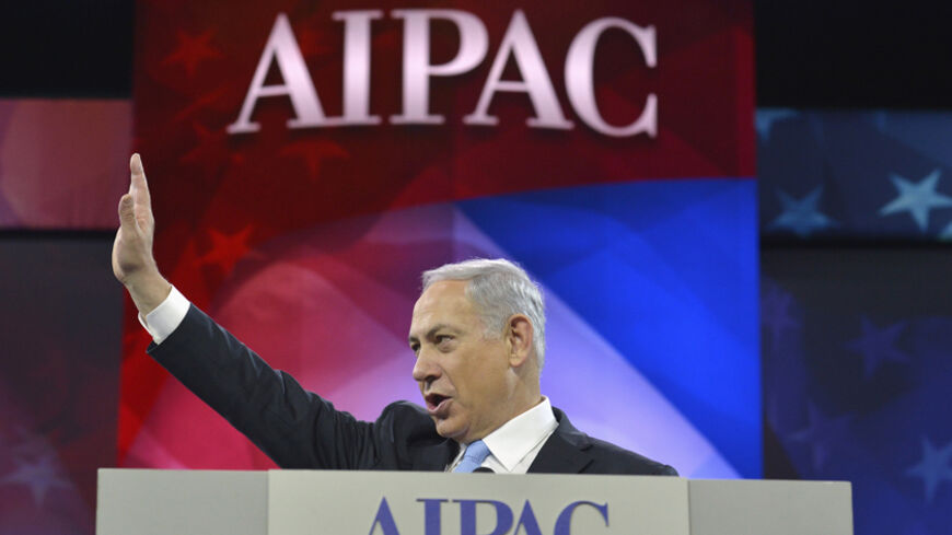 Israeli Prime Minister Benjamin Netanyahu acknowledges applause as he arrives to address the American Israel Public Affairs Committee (AIPAC), in Washington, March 4, 2014. Netanyahu urged world powers on Tuesday not to allow Iran to retain the ability to enrich uranium, saying it must be stripped of all nuclear technologies with bomb-making potential. REUTERS/Mike Theiler (UNITED STATES - Tags: POLITICS TPX IMAGES OF THE DAY) - RTR3G15H