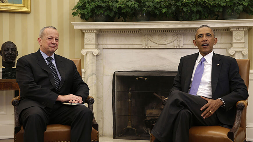 U.S. President Barack Obama (R) meets with retired Marine Corps General John Allen in the Oval Office of the White House in Washington September 16, 2014. Obama has chosen retired Allen, who served as the top U.S. commander in Afghanistan, to coordinate international efforts to fight Islamic State militants in Iraq and Syria. Allen is named as the Special Presidential Envoy for the Global Coalition against ISIL, the acronym the administration used for the Sunni Islamist movement.    REUTERS/Gary Cameron    