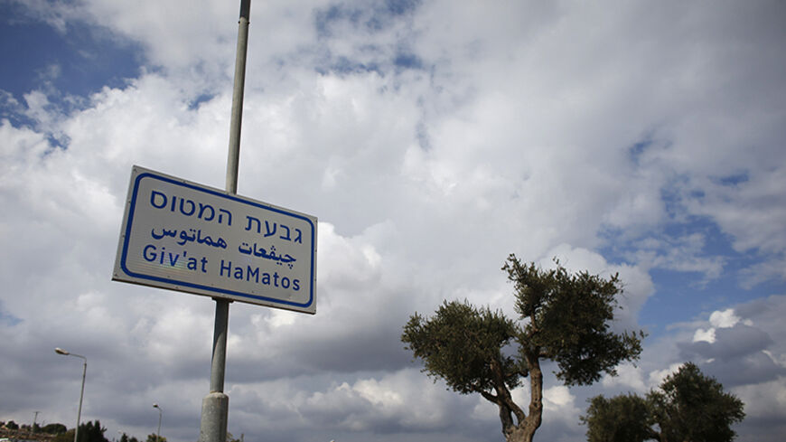 A signpost is seen in Giv'at HaMatos, a neighbourhood on the southern fringes of Jerusalem's city limits where according to anti-settlement watchdog Peace Now, Israel decided to move forward on a settler housing project slated for construction since 2012, October 2, 2014. President Barack Obama and Israeli Prime Minister Benjamin Netanyahu met on Wednesday in Washington. Netanyahu's visit was clouded by word of Israel's approval of the planned construction of more than 2,600 settler homes in mostly Arab Eas