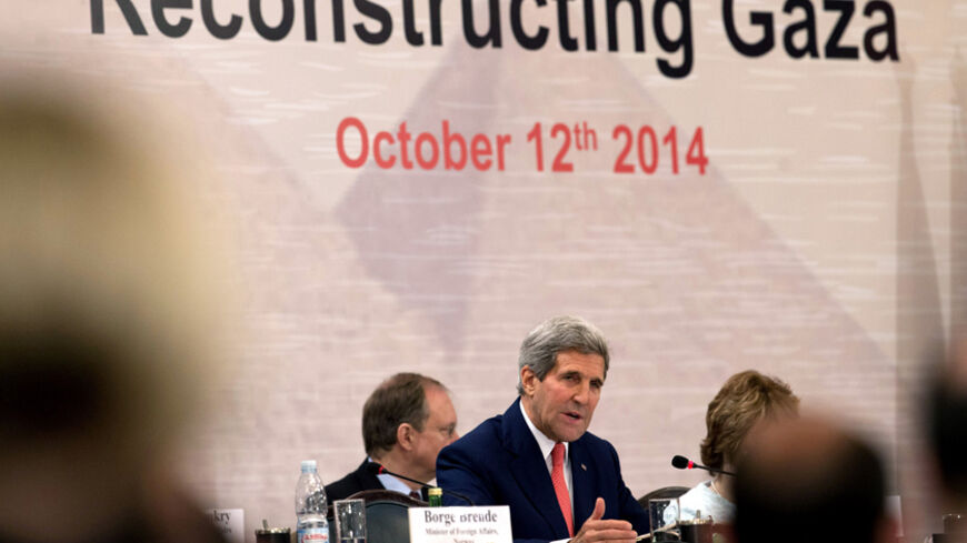 U.S. Secretary of State John Kerry speaks during the Gaza international donors conference in Cairo October 12, 2014. Kerry announced on Sunday an additional $212 million in aid to the Palestinian people at a Cairo conference on rebuilding Gaza following a war earlier this year.  REUTERS/Carolyn Kaster/Pool (EGYPT - Tags: POLITICS) - RTR49UL4