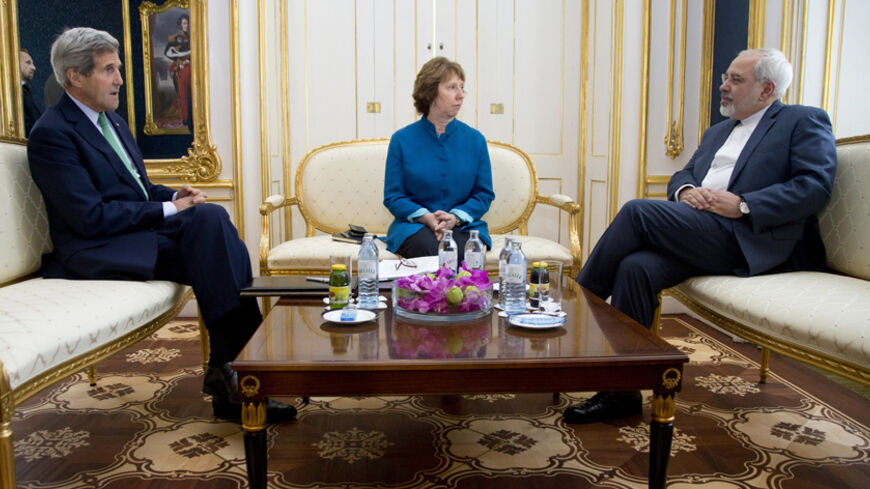 (L-R) U.S. Secretary of State John Kerry, European Union Foreign Policy Chief Catherine Ashton, and Iran's Foreign Minister Mohammad Javad Zarif are photographed as they participate in a trilateral meeting in Vienna October 15, 2014.    REUTERS/Carolyn Kaster/Pool (AUSTRIA - Tags: POLITICS) - RTR4A9TZ