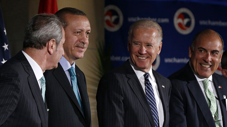 U.S. Vice President Joe Biden is pictured with Turkey's Prime Minister Recep Tayyip Erdogan (2nd L) during an event at the U.S. Chamber of Commerce in Washington, May 16, 2013. Pictured at right is Coca Cola CEO Muhtar Kent.      REUTERS/Jason Reed    (UNITED STATES - Tags: POLITICS) - RTXZPQL