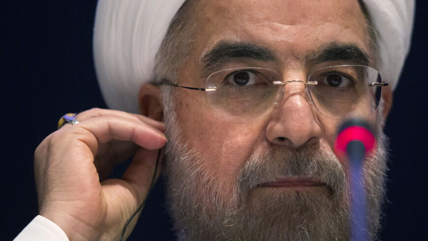 Iran's President Hassan Rouhani listens to a question during a news conference on the sidelines of the 69th United Nations General Assembly at United Nations Headquarters in New York September 26, 2014. Rouhani said on Friday "courageous decisions" must be made to clinch a long-term nuclear agreement and that any deal without the lifting of all sanctions against Tehran was "unacceptable".  REUTERS/Adrees Latif   (UNITED STATES - Tags: POLITICS HEADSHOT) - RTR47VNT