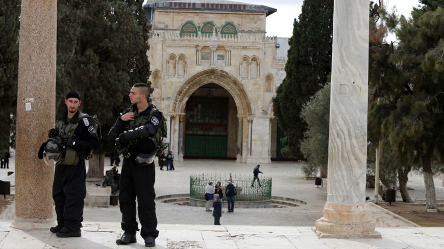 Israeli police officers stand guard on the compound known to Muslims as Noble Sanctuary and to Jews as Temple Mount in Jerusalem's Old City November 5, 2014. As Jordan joins a military campaign against Islamic State militants in Syria, tensions in Jerusalem pose a potentially bigger risk to a nation only slightly scathed by the turmoil sweeping the Middle East. Picture taken November 5, 2014.
To match Insight MIDEAST-CRISIS/JORDAN-STABILITY 
REUTERS/Ammar Awad (JERUSALEM - Tags: MILITARY POLITICS RELIGION C