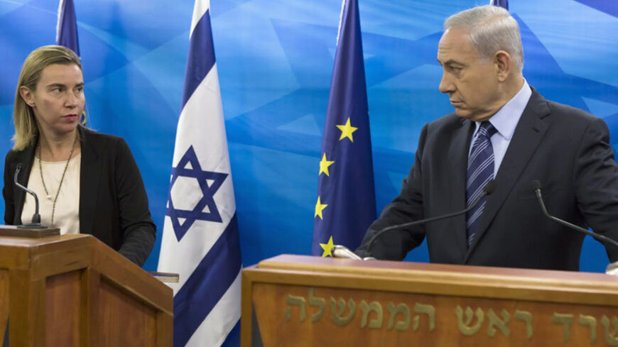 European Union foreign policy chief Federica Mogherini (L) attends a media conference with Israeli Prime Minister Benjamin Netanyahu in Jerusalem November 7, 2014. REUTERS/Jim Hollander/Pool     (ISRAEL - Tags: POLITICS CIVIL UNREST TPX IMAGES OF THE DAY) - RTR4D9OH