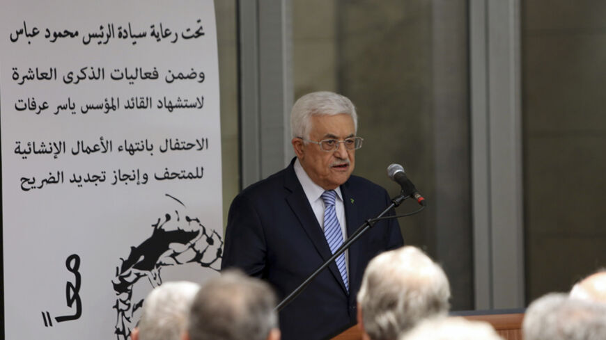 Palestinian President Mahmoud Abbas speaks at the opening of a museum of late Palestinian leader Yasser Arafat in the West Bank city of Ramallah, November 9, 2014. REUTERS/Abbas Momani/Pool (WEST BANK - Tags: POLITICS) - RTR4DGOL