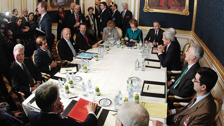 French Foreign Minister Laurent Fabius (3rd L), EU envoy Catherine Ashton (6th L), U.S. Secretary of State John Kerry (3rd R) and Britain's Foreign Secretary Philip Hammond (front L) sit a a table during talks in Vienna November 21, 2014. Iran, the United States, Britain, France, Germany, Russia and China began the final round of negotiations on a nuclear deal on Tuesday. Officials close to the talks have said the two sides are unlikely to secure a final agreement and may need to extend the negotiations.  R
