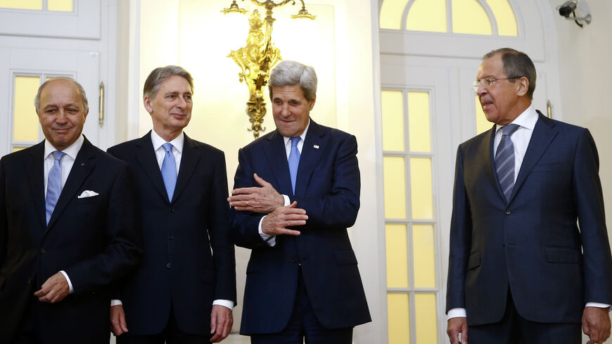 French Foreign Minister Laurent Fabius, Britain's Foreign Secretary Philip Hammond, U.S. Secretary of State John Kerry and Russian Foreign Minister Sergei Lavrov (LtoR) pose for photographers before a meeting in Vienna November 24, 2014. Iran, the United States and other world powers are all but certain to miss Monday's deadline for negotiations to resolve a 12-year stand-off over Tehran's atomic ambitions, forcing them to seek an extension, sources say. The talks in Vienna could lead to a transformation of