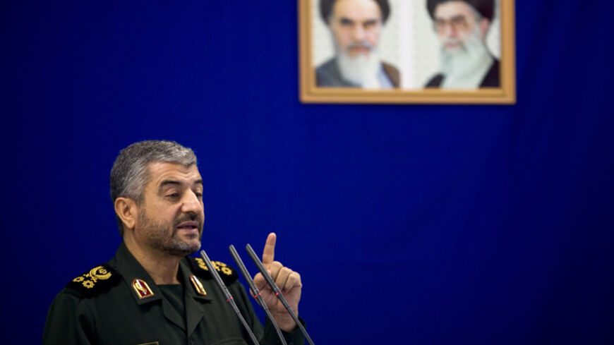 Head of Iran's Revolutionary Guards force, General Mohammad Ali Jaafari speaks at a University during Friday prayers in Tehran November 23, 2007. REUTERS/Morteza Nikoubazl (IRAN) - RTX3YZH